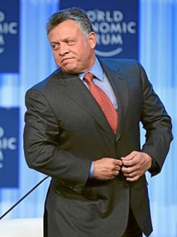 King Abdullah calls for early parliamentary elections.