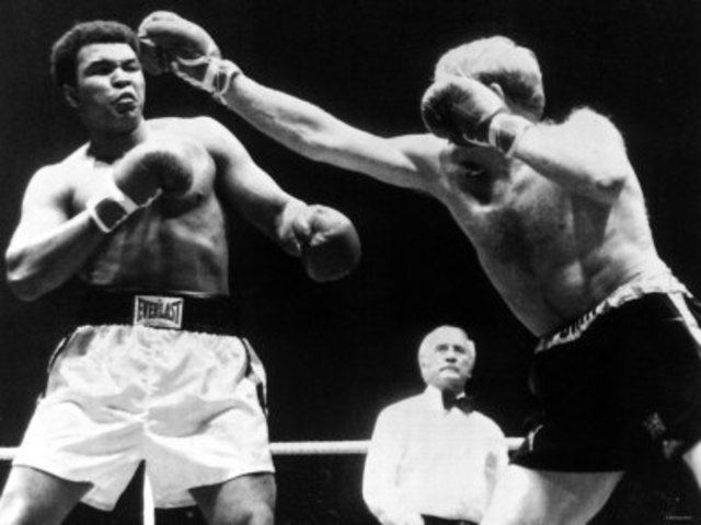 Cassius Clay (a.k.a. Muhammad Ali) Becomes World Heavyweight Champion