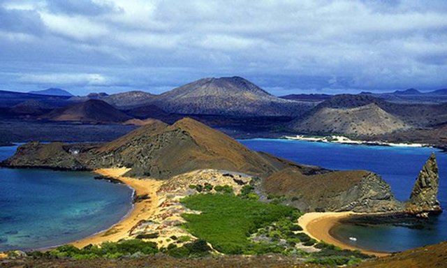 Lands in the Galápagos Islands.