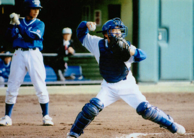 He began playing baseball