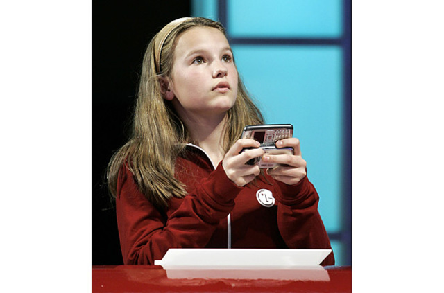 Morgan Pozgar, 13, of Claysburgh, Pennsylvania, competes in the LG National Texting Championship at the Roseland Ballroom in New York.