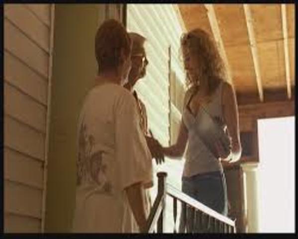 Erin stays in a nearby motel and goes door-to-door, seeking the additional signatures.