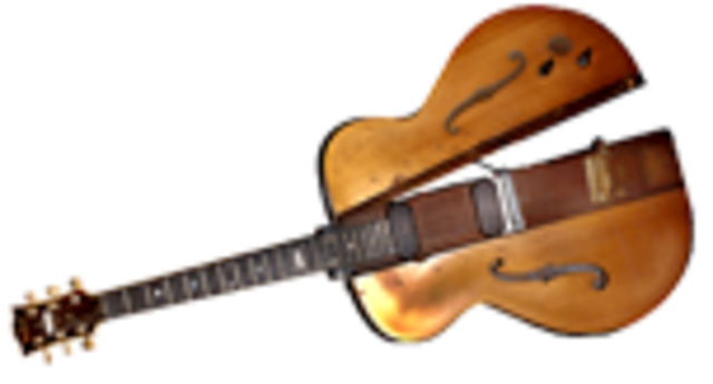 Les Paul invents "The Log" guitar.