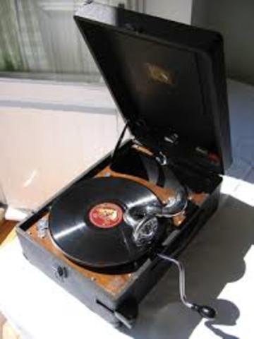 Compatible Stereo disks and record players are offered for sale (33 1/3 and 45rpm.)