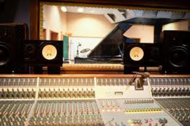 Multitrack analog tape recording starts being used in recording studios.