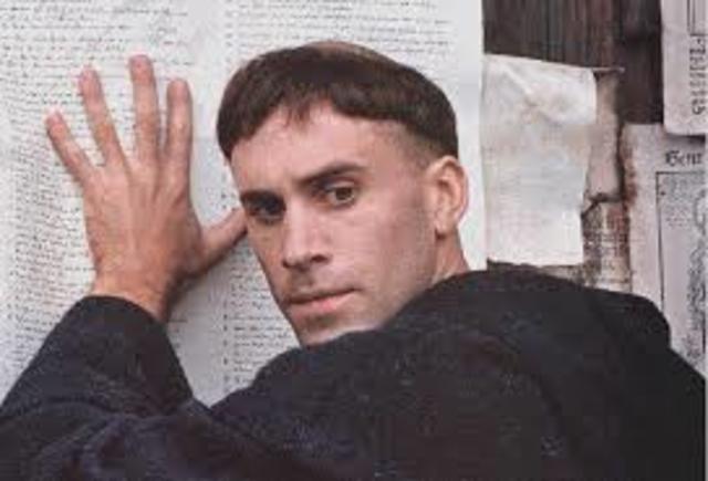 Martin Luther posts 95 Theses