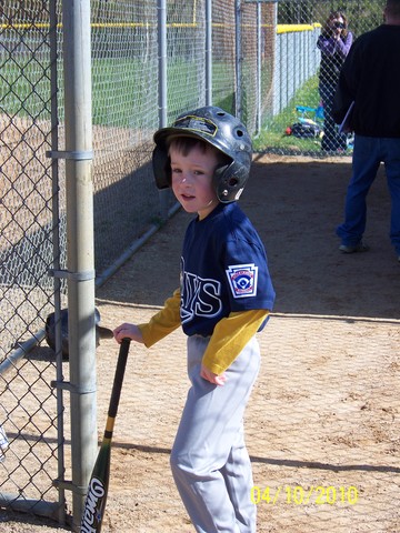 Playing T-Ball as a boy