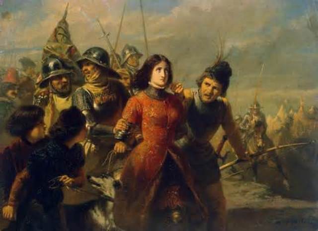 Joan of Arc  burned at the stakes