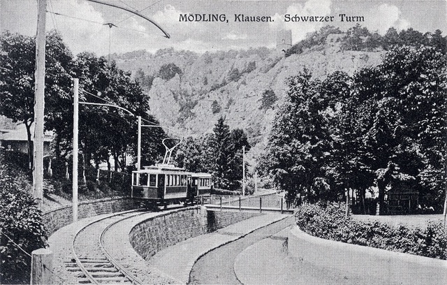 The first electric tram operating from an overhead line opens in Austria