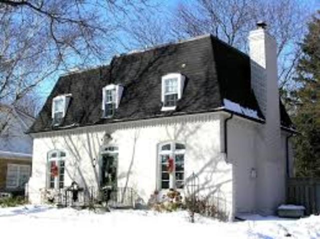 french manor with mansord roof