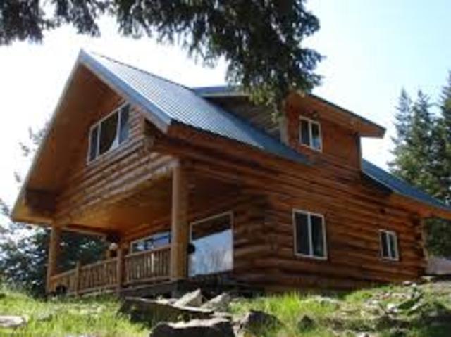 log cabin with chinking and gable roof