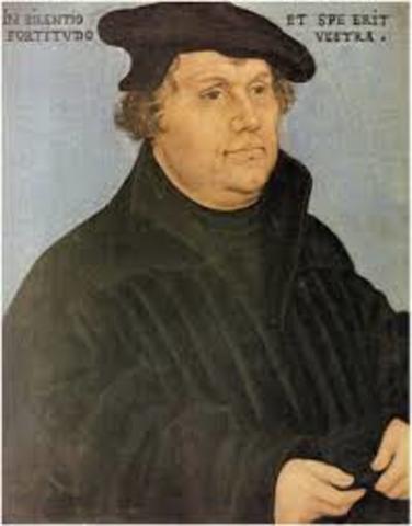 German Monk Martin Luther nails his ninety-five theses to the church door