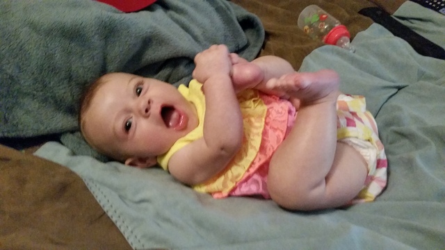 Emily figured out she had toes and hands