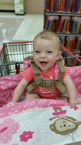 Emily's first time sitting in a cart