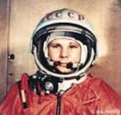 Soviets send first human into space