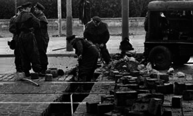 Building of Berlin Wall begins