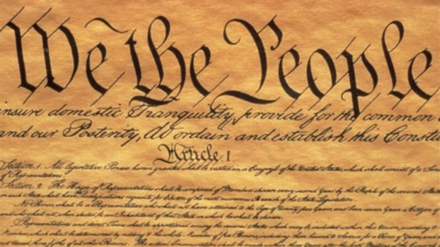 Ben Franklin signs the U.S.A Constitution