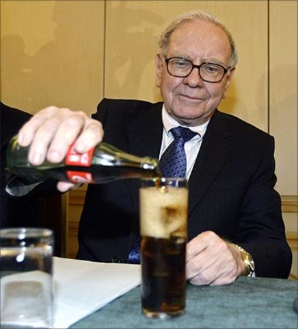Buffett Decides to Buy Stock in Coca-Cola