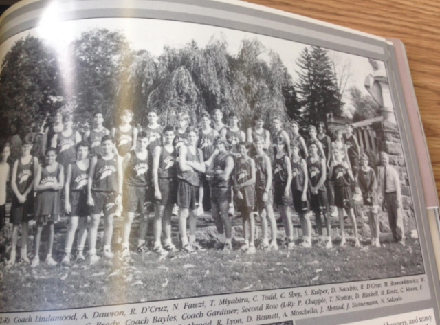 Track Team in front of Senior Garden Wall