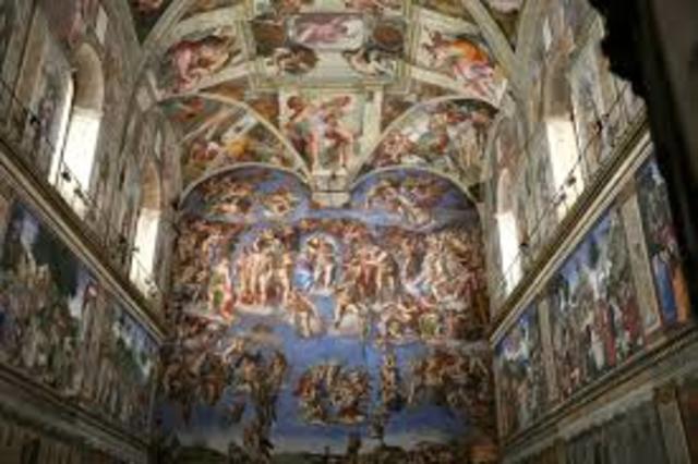 Michelangelo begins to paint the sistine Chapel