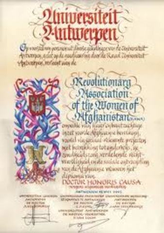 Receives honorary doctorate from Lewis and Clark University.