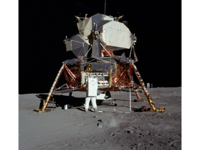 Apollo 11 astronaut Neil Armstrong transmits the first words from the surface of the moon: "Houston, the Eagle has landed."