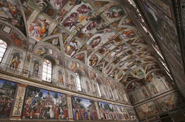 Michelangelo begins painting Sistine Chapel