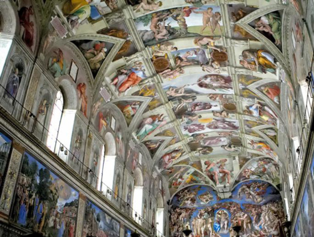Michelangelo begins painting Sistine Chapel