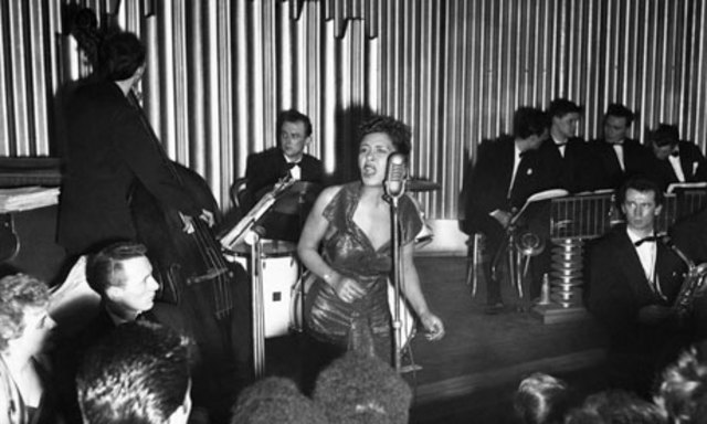 Billie Holiday first performs "Strange Fruit" in New York