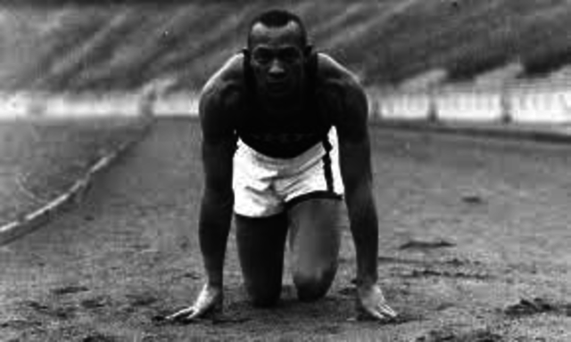 Jesse Owens wins four gold medals.