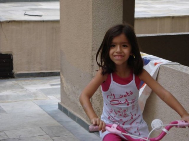 Andando de bicicleta- Carol