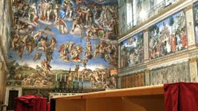 Michaelangelo begins painting Sistine Chapel