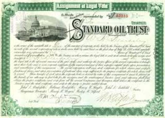 Rockefeller creates Standard Oil trust