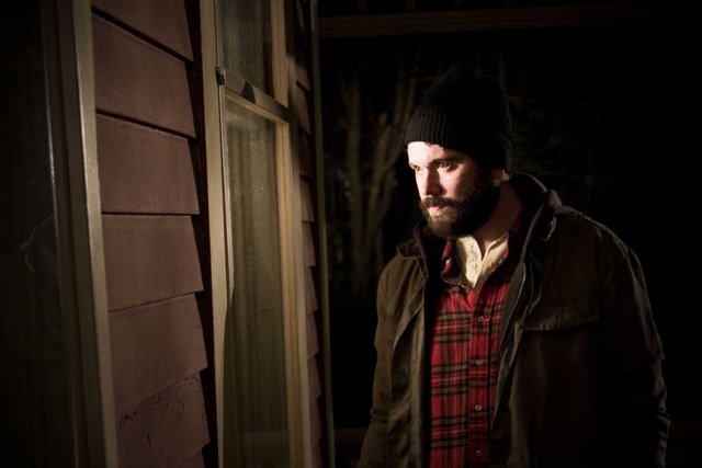 Montag stands outside of Clarisse's house