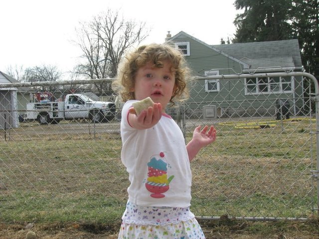 Offering daddy a pretty rock!