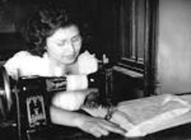 Coco gets a starting job as a seamstress