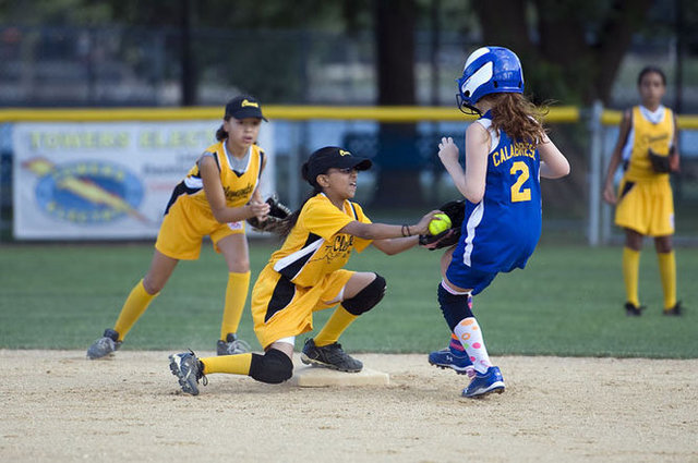 First softball game played