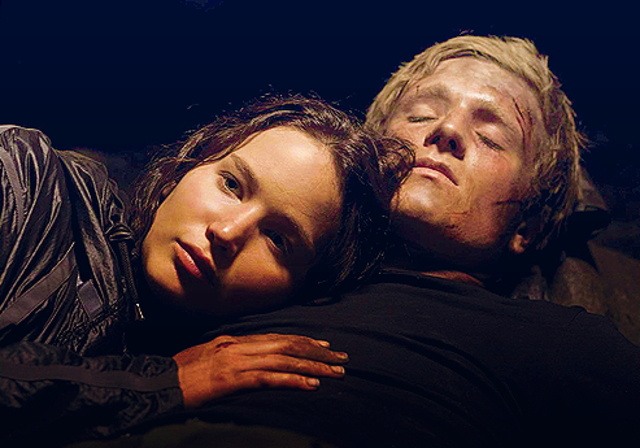 Katniss finds Peeta dying of injuries and saves his life