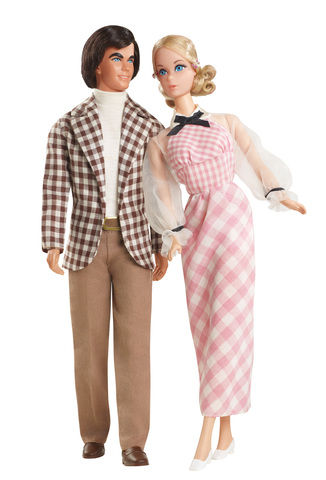 Ken with sideburns and Barbie with curled ends