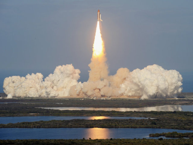Space Shuttle Discovery lifts off for the International Space Station.