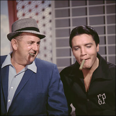 Elvis Presley signs management deal with "Colonel" Tom Parker