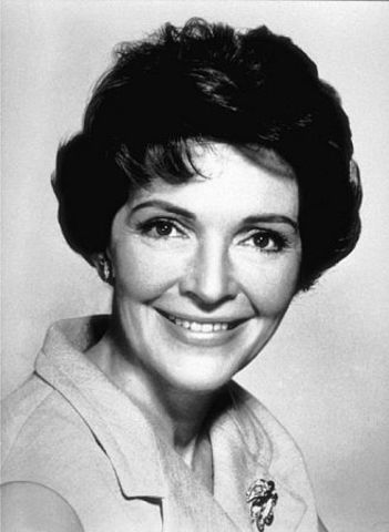 Reagan marries movie actress Nancy Davis wed.