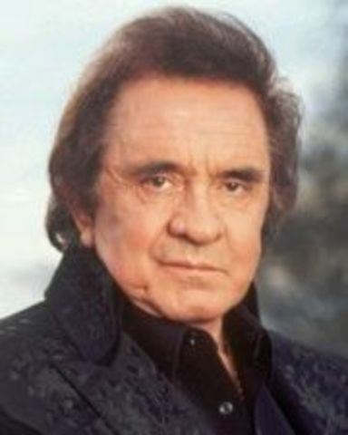 Johnny Cash plays first of many free concerts behind bars