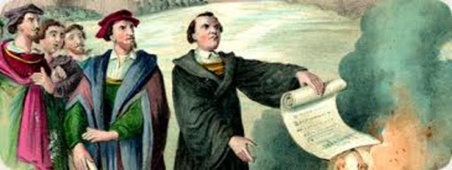 The church excommunicates Luther