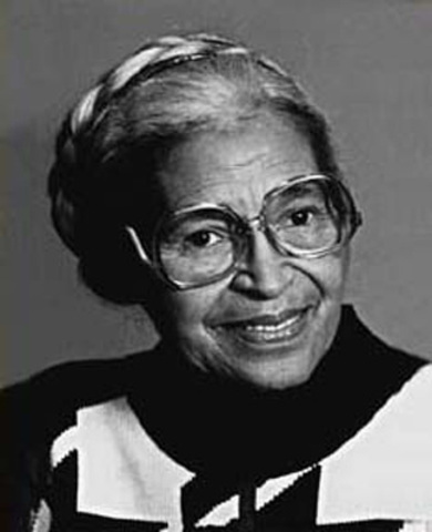 Rosa Parks refuses to give up her seat to a white passenger.