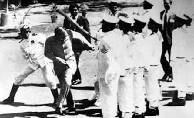 Ghandi gets beaten up