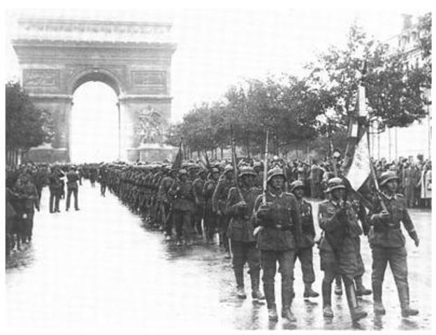 France signs an armistice with Nazi Germany and Adolf Hitler tours Paris