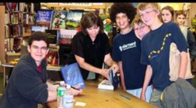 Promotes 1st book by visiting schools (day unknown)