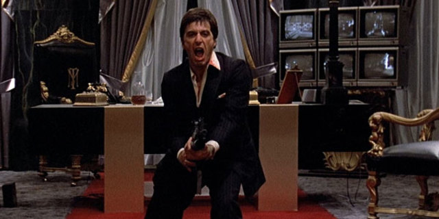 Had a stand-off with the police, died like Scarface