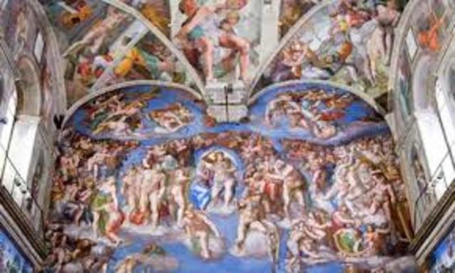 Michelangelo paints the ceiling of the sistine chapel